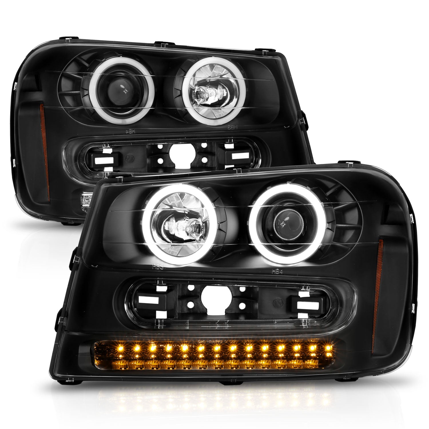 CHEVY TRAILBLAZER 02-05 PROJECTOR HEADLIGHTS HALO BLACK CLEAR AMBER (RX HALO)